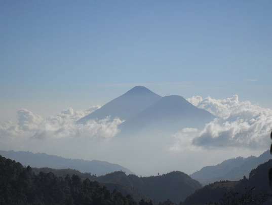27 Volcano.jpg - The tour members traveled to high elevations seeking the types of produce that are grown in these regions and discovered farmers that were eager to convert to organic production. They also noticed the farmers grew mostly for themselves and were gratified with the attention and enthusiastic about greatly increasing organic production.